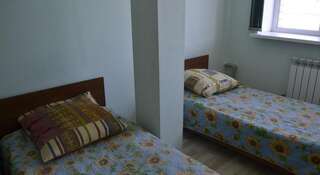 Гостиница Олимп Бор Односпальная кровать в общем номере с 3 кроватями-6